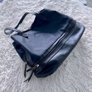 LIKE NEW! Multi-functional black nylon bag with faux leather shoe pocket/straps